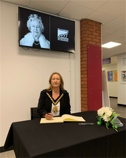 Lord Mayor signing the Condolence book